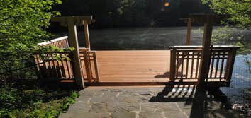Dock on a lake with a gate