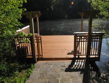 Dock on a lake with a gate