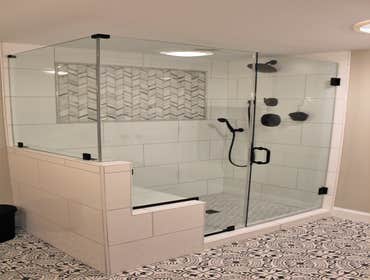 Basement Bathroom with Tiled Shower by Mione Family Remodeling