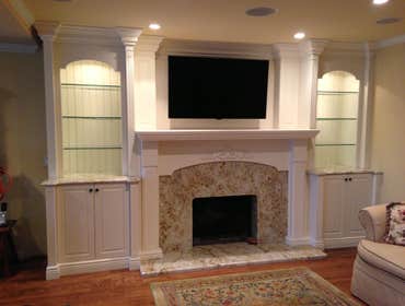 Photo(s) from North Shore Closets & Cabinetry Inc. Fireplace Surround & Bookcases