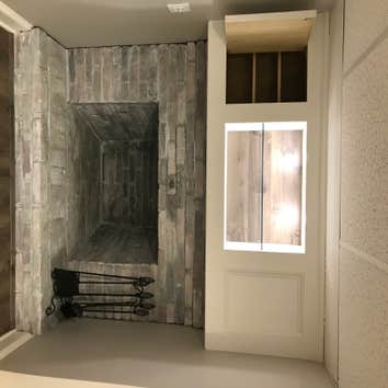 Finished basement custom built- in over fireplace