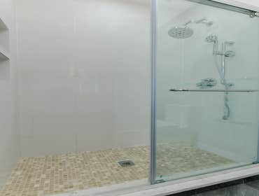 Photos by Urbanity Homes #1 Maverick St Boston MA
The Maverick Street condos are a study in materials. Simple geometries are given interest with contra