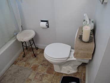 Belmont Shore Bathroom This project was a small bathroom in Belmont Shore. We turned the tub into a shower and moved the shower head to the opposite wa