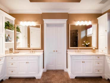Traditional Bath by Mantis Design + Build, LLC The clients knew that it was time to do something about their poorly constructed master bathroom when th