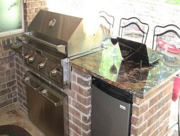 Cedar Garage Door and Backyard Kitchen