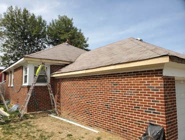 Handi Boyz Kenny G Lassiter Repairing Fascia in West Mt Airy