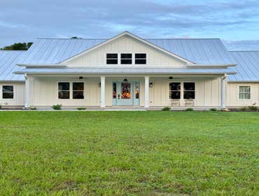Custom Coast Farm House Built In Crawfordville Florida This custom coastal farmhouse was built by Forgotten Coast Construction LLC in Crawfordville Flo