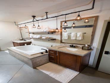 Photos from Arista Development LLC Our Rustic Industrial Home Collection is designed to represent a modern loft condominium converted from an industria