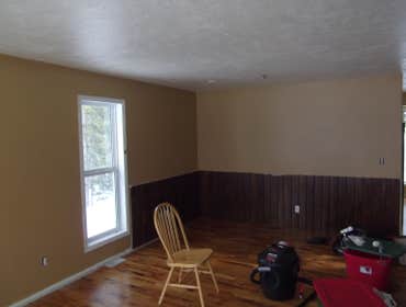 Interior/exterior painting and staining three bedroom house, installing trims, complete repainting (7 colors),