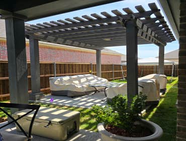 Pergola shade structure Painted cedar pergola, custom fabricated post plates.
