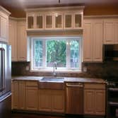 KITCHEN #4 This is a total replacement kitchen but it was kept in the same configuration as the original with a little dress up over the sink. These a