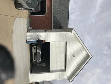 Photos by Modern Renovations #2 20' x 48' Attached RV Garage, Full Power Hook-ups, Central Heat & A/C, Front And Rear 14' Garage Doors