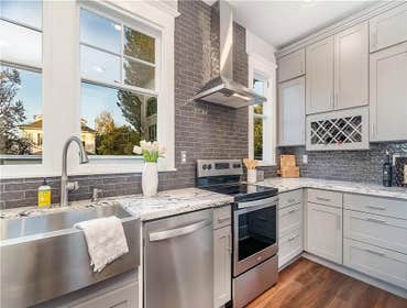1908 complete kitchen remodel, new drywall, tile, appliances, sink, cabinets and flooring..