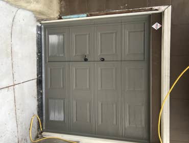 Custom walkthrough Garage Door Garage Door with Walkthrough in-swing door by Garage Tec, Inc.