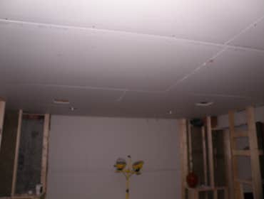 Photos from Vh improvement inc transforms a room in the basement into a media room
