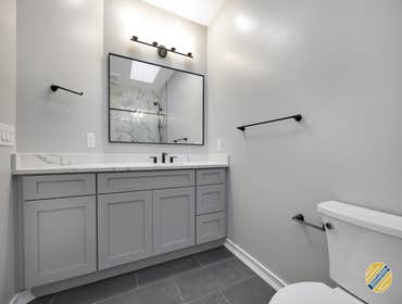Compact Contemporary Bathroom Today we’d like to share how you can create a simple but contemporary bathroom in a small space!
We used a vanity with a