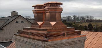 Applied Roofing Technology / Projects Copper Roofs, chimney caps & conductor head.
