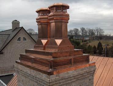 Applied Roofing Technology / Projects Copper Roofs, chimney caps & conductor head.
