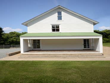 Farmhouse & Land Alterations Alterations to a farmhouse, accessory structures and land on the last two acres of a 1911 dairy farmstead located along an