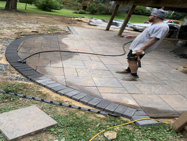Stone paver patio West Chester dug out 4 inches
pitched the soil
laid 3/4 in stone
laid sand
pitched sand for draining away from the house
laid stone