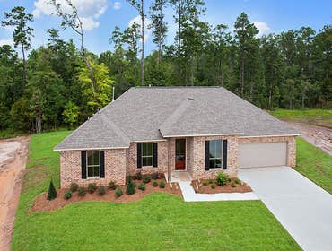 Photo(s) from Jenkins Homes, Inc. This home in Covington, LA has 4 bedrooms, 3 bathrooms and resides on a large cul-de-sac lot. It features an exterior
