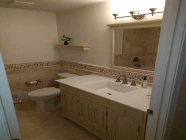 Travertine with style Full remodel of this 1970's bathroom. Which features
Soaker alcove tub - Kohler Archer
44 inch high walls through out bathroo