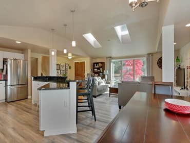 Full Remodel with raised ceiling from 8' to vaulted ceiling with skylights.
