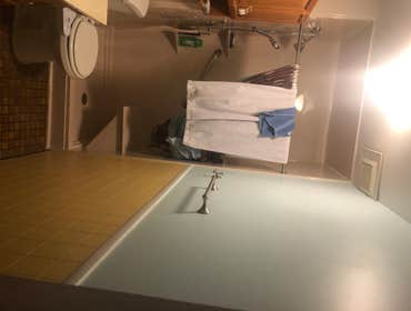 Linoleum Tile (on wall). We gave it a fresh look by treating the wall and giving it a fresh coat