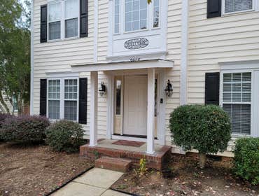 Built porch over front entryway/installed new door
