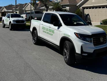 Photos by Green Leaf Roofing Working on shingle roof replacements in the HOA community