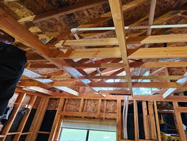 Fine Design Remodeling resume painting, frame, tile, cabinet install, shower, more.