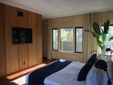 Master bedroom w/ teak panels
