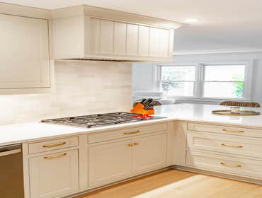 Photos by Albrecht, LLC #1 Through strategic space planning, thoughtful material selections, and custom craftsmanship, this first-floor renovation tran