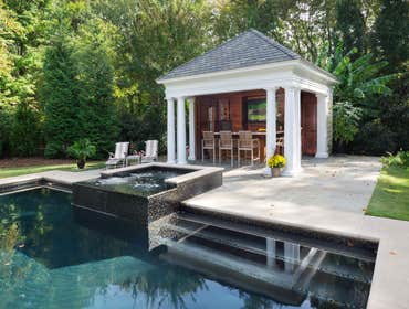 Tropical Retreat Designed custom pool, hot tub, cabana, and fire feature 