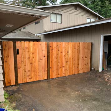 Photos by Lifetime Construction #1 This was a 13ft long 6ft tall cedar privacy fence with a 40” gate that a customer had wanted built to provide a tena