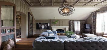 Upper Road An elegant country estate of large scale rooms blending into one another enlivens this family home. Custom wood paneling, and custom designe