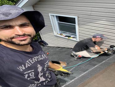 Photos by Us Success Properties LLC #1 Construction of a new roof structure over an existing residential deck. Scope of work included installation of s