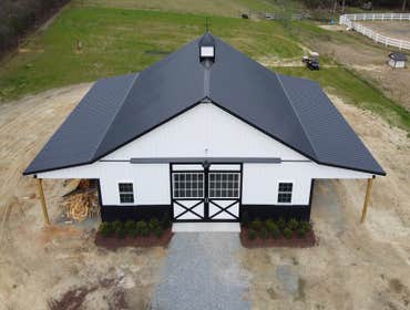 4-Stall Horse Barn This is a classic, 4-stall equestrian building. The dimensions are 36’x36’x10’, with two 10’ wide lean-tos. The stalls are 12’x12’, 