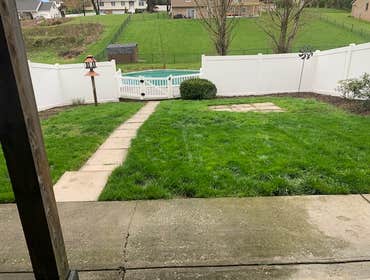 outdoor living space Removed grass and concrete patio and sidewalk.
Designed and installed exposed aggregate concrete patio and landscaping, with pond 
