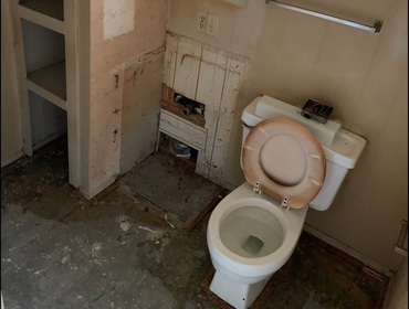 Powder Room prior to undergoing a redesign and remodel