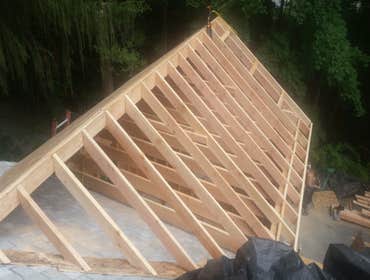 Addition Second floor addition on top of existing garage. Leveled out floor, framed walls and roof. Finished exterior roofing and siding. Moved windo