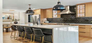 Millbridge The homeowners wanted to take their starter home and make it their forever home. For this multi phase remodel, we started with renovating th