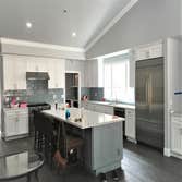 White/Grey Shaker Kitchen Remodel Entire Kitchen, Countertop project in a new construction house. White Shaker and Grey Shaker Cabinets. Quartz Counter