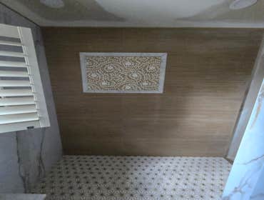 Photos by MC ALISTER TILE #1 5 showers total, was hired after another handyman did not water proof correctly, fixed all water proofing and installed 