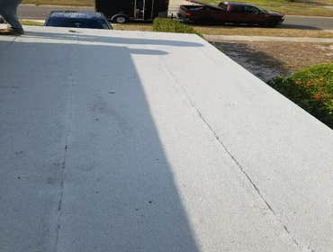 Photos by American Commercial Construction & Development, Inc #4 Pitch and re roof flat