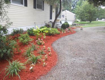 Customer Like Red Mulch This project was a complete front of the house renovation, which included installing a new lawn and interesting plantings to cr
