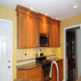 Maui Kitchens Incorporated Project Here is a project we did in Bethlehem, this family wanted to open up their space and find a way to work in an island