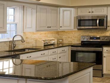 Kitchen Cabinet Refacing View our project portfolio to see our high-quality kitchen cabinet refacing restorations.