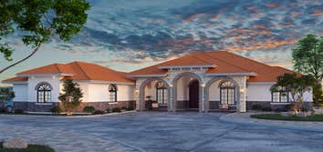 Custom Home in North Port Florida with Solar Fully custom 3 Car Sideloading Garage home with Spanish flare in North Port Florida