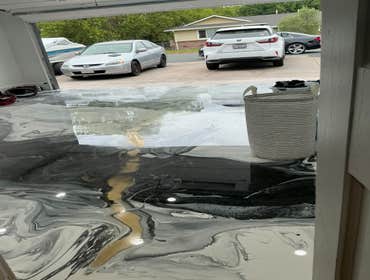 Photos by V2 Construction & Remodel #4 Garage transformed with an all new Resin Floor! Really is just a fascinating look.